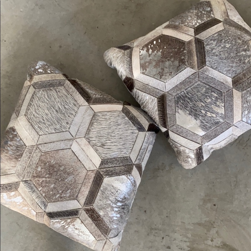 A Pair of calf hair cowhide patchwork pillows